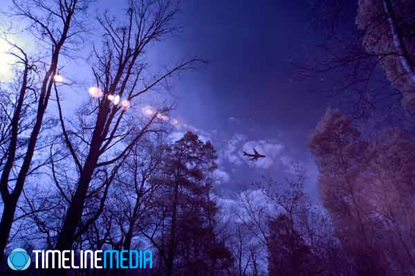 Plane landing at Dulles from a Chantilly, Virginia park in infrared evoking the TV show Lost ©TimeLine Media