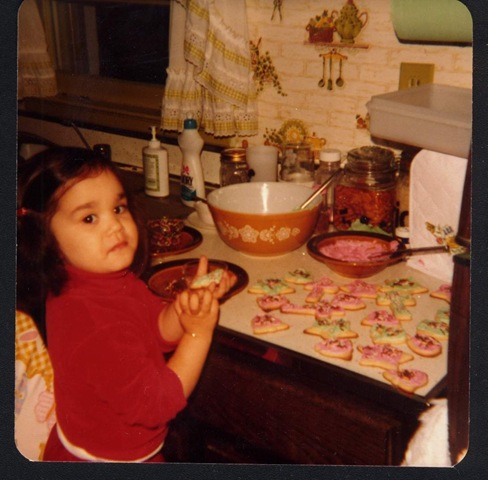 Bryony making cookies at an early age