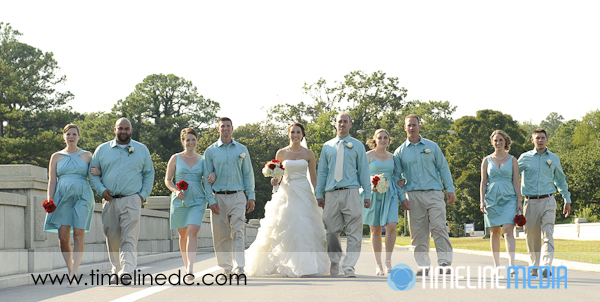 Wedding photography - Leah and CJ walking with their bridal party on their wedding day ©TimeLine Media