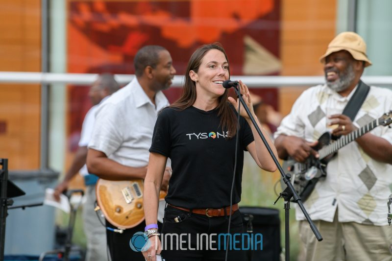 Meghan Trossen of the Tysons Partnership speaking at the Tysons Tailgate ©TimeLine Media