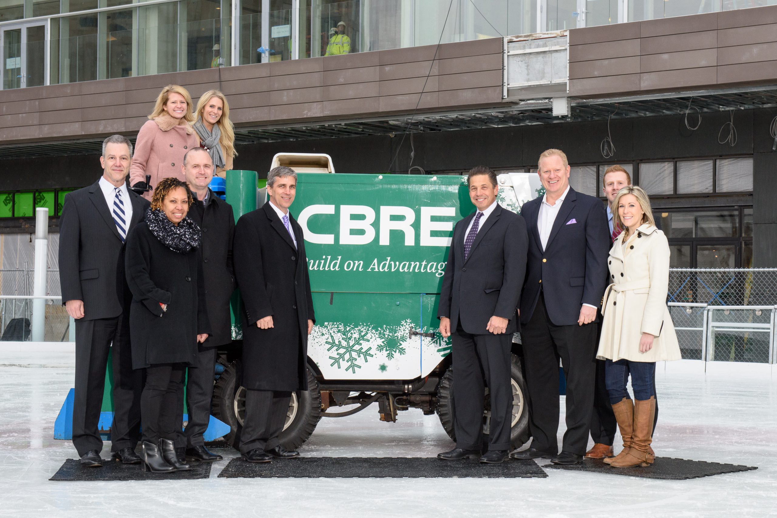 CBRE staff photo on the Plaza ice rink at Tysons Corner Center