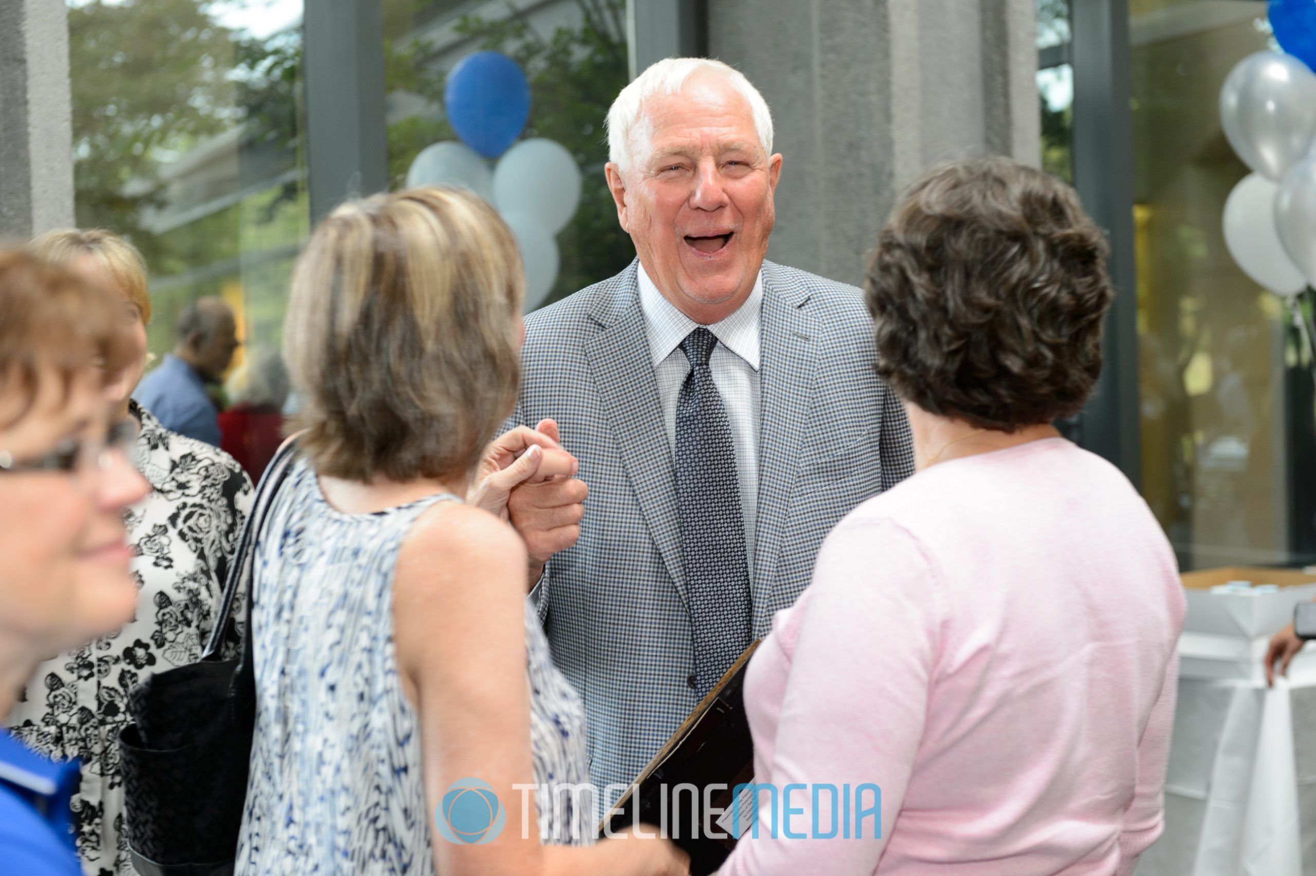 Milt Peterson talking with guests ©TimeLine Media
