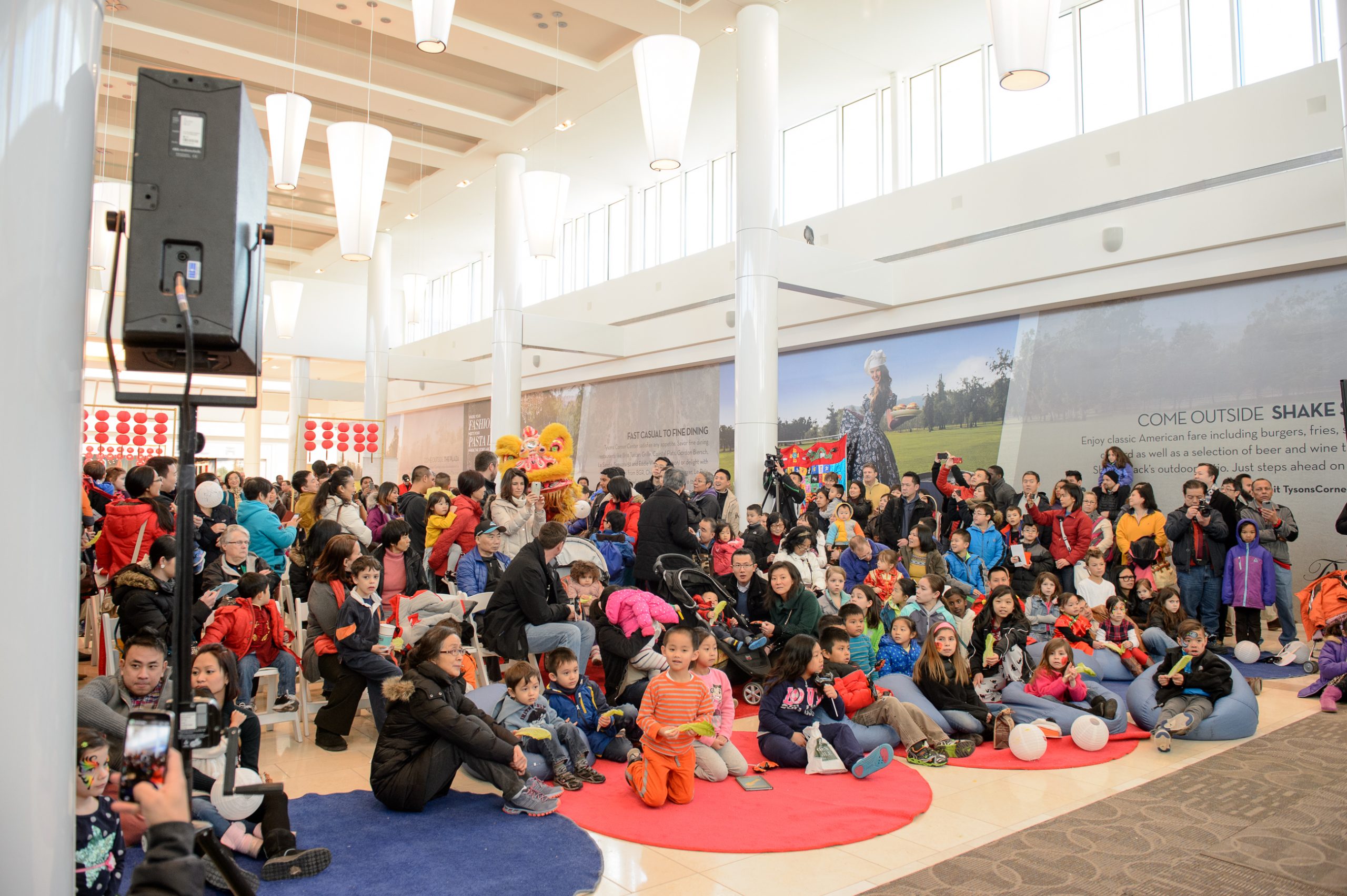 Crowd at Lunar New Year celebration at the Concourse in Tysons Corner Center