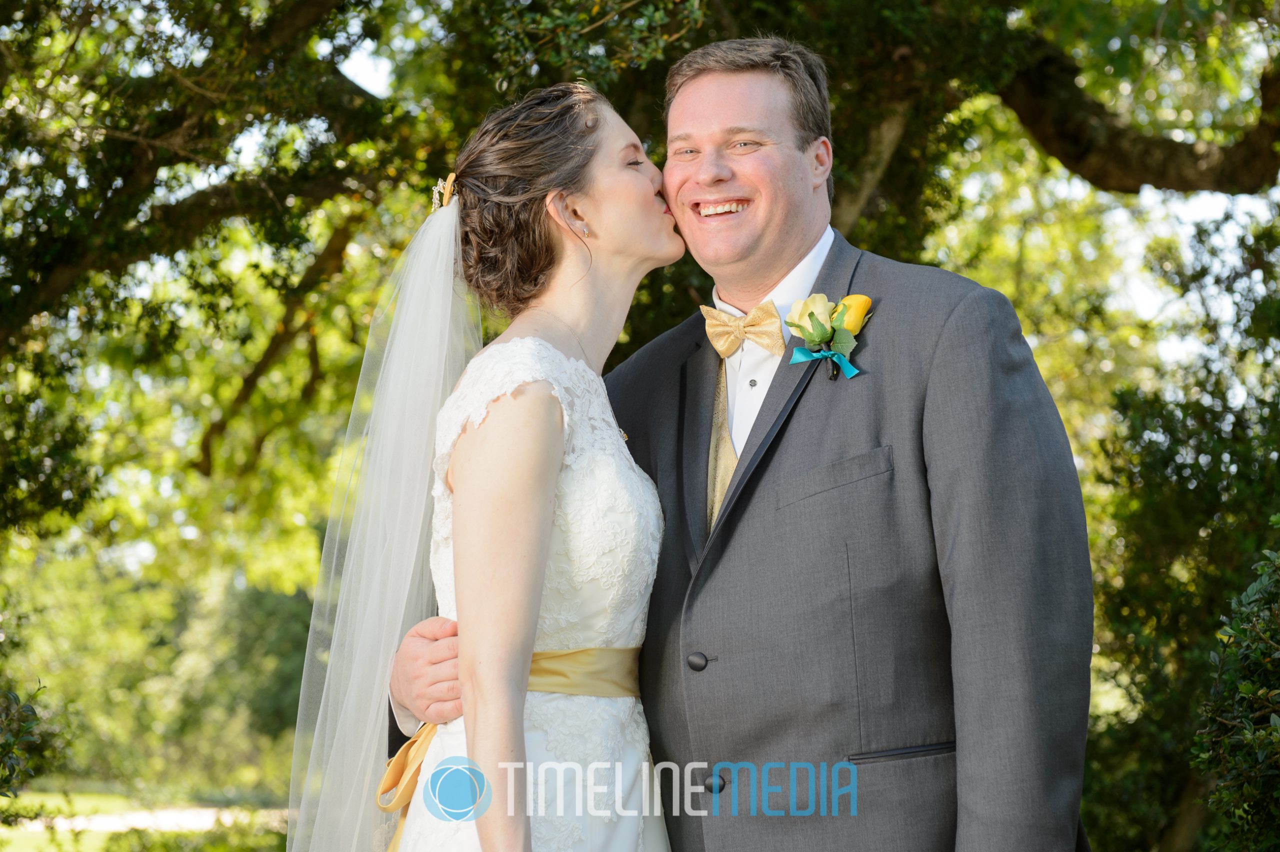 Bride kisses her groom ©TimeLine Media