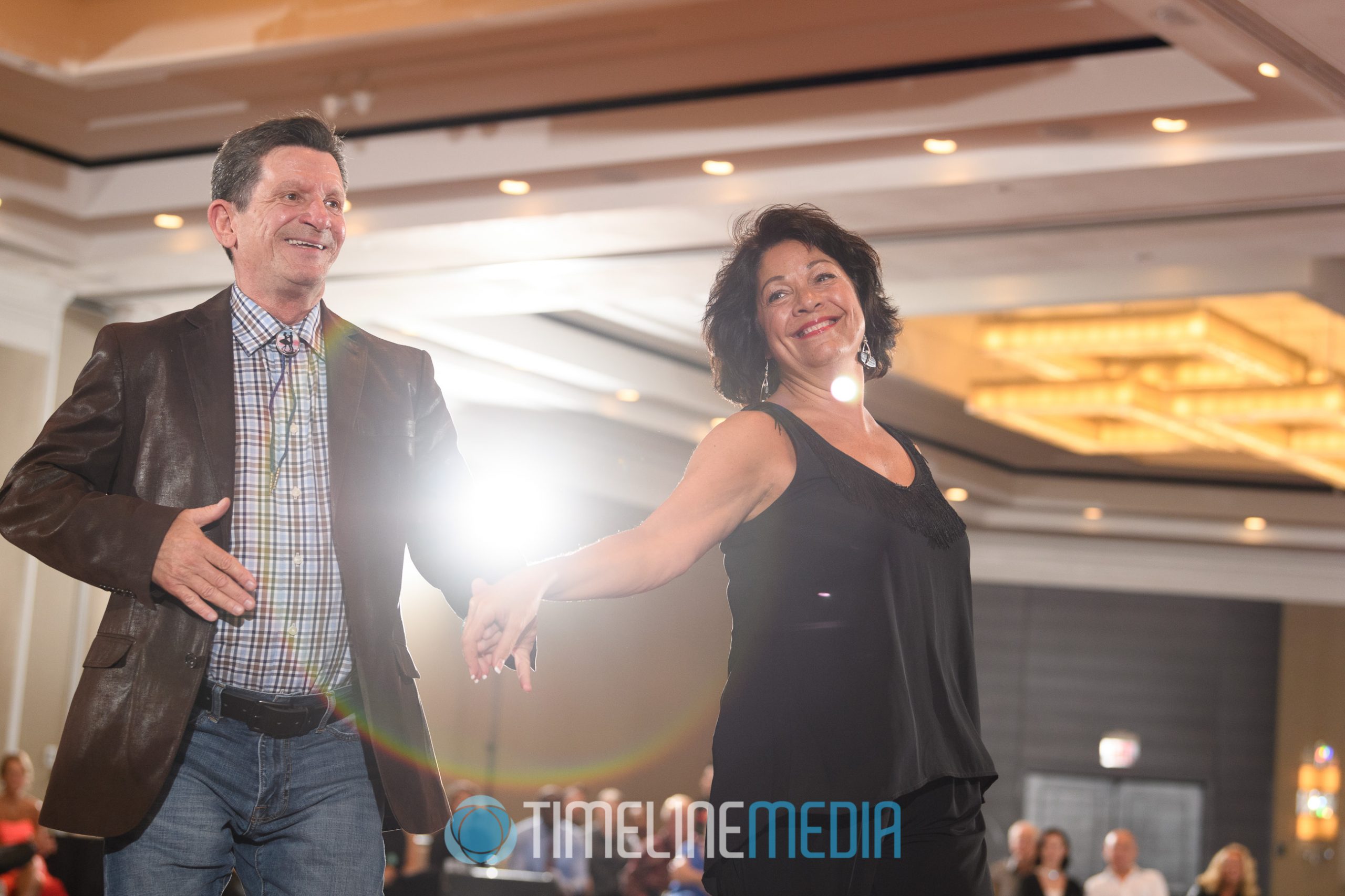 John and Carol Clark spotlight dance Tysons, VA ©TimeLine Media
