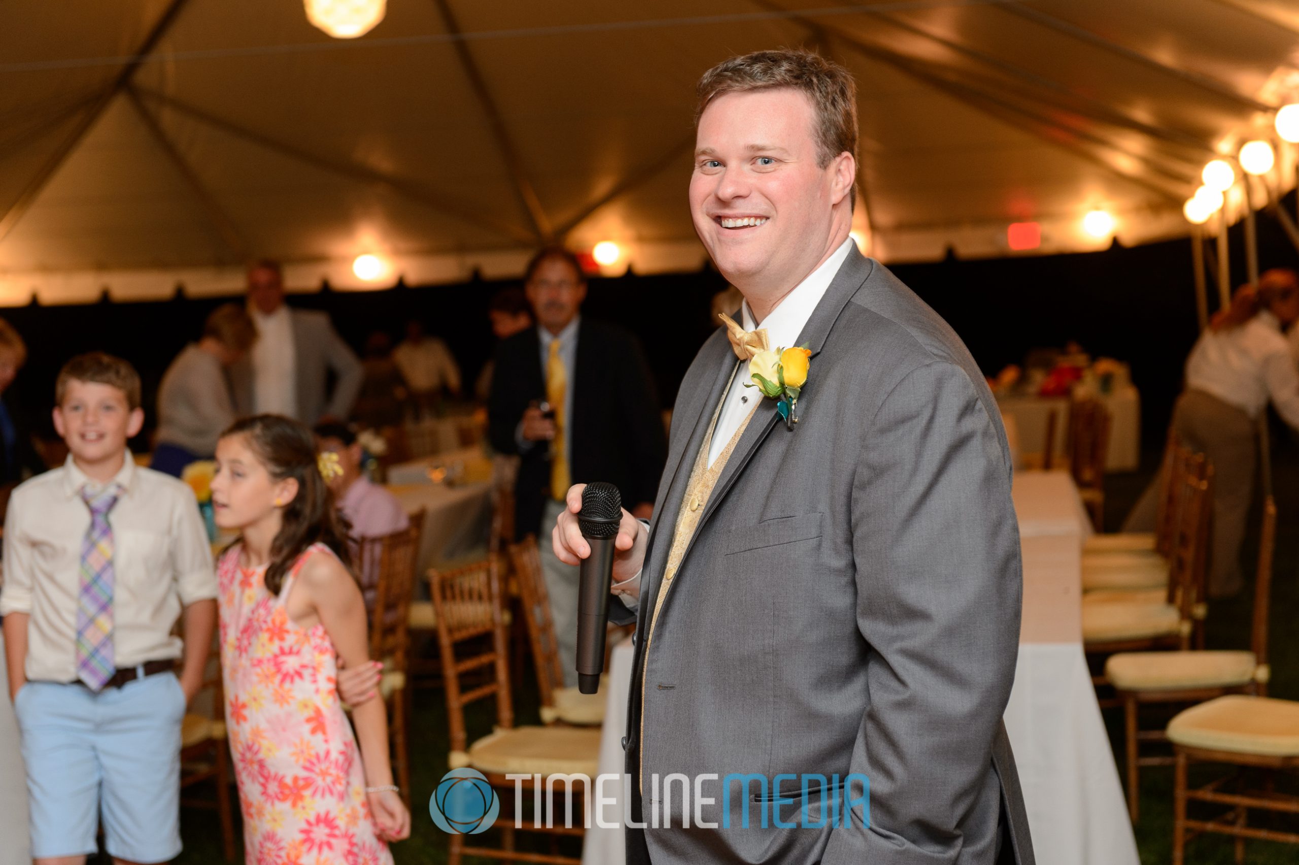 Groom at wedding reception ©TimeLine Media