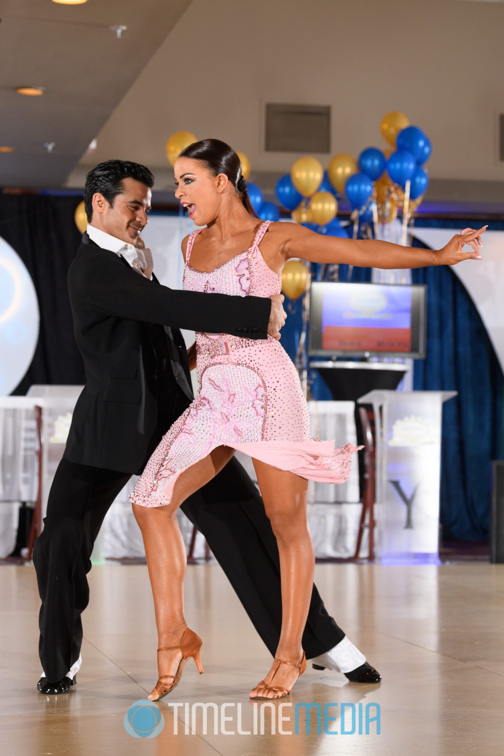 Tal Livshitz and Ilana Keselman dancing a professional show at a Virginia Beach competition ©TimeLine Media