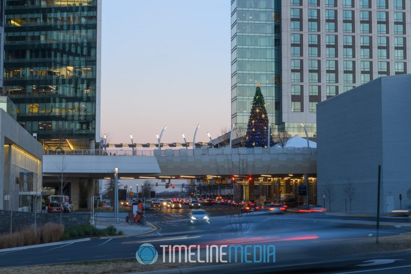 Lit Christmas Tree on the Plaza with holiday shopping traffic at Tysons Corner Center