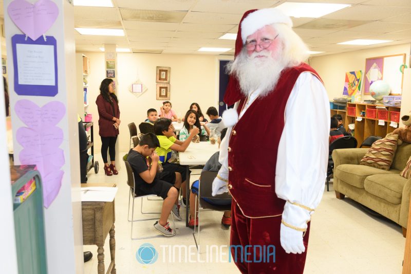 Santa visits the Culmore Family Resource Center in Falls Church, Virginia