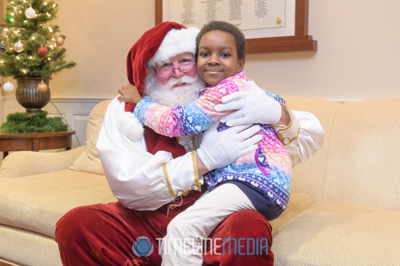 Sitting with Santa at the Life with Cancer Family Center in Fairfax, VA