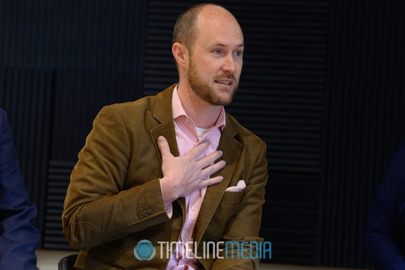 Tucker Wannamaker speaking on the Charity to Change panel at Industrious in Arlington, VA ©TimeLine Media