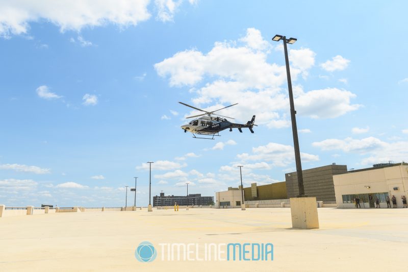 Fairfax 1 helicopter approaching a landing area at Tysons Corner Center