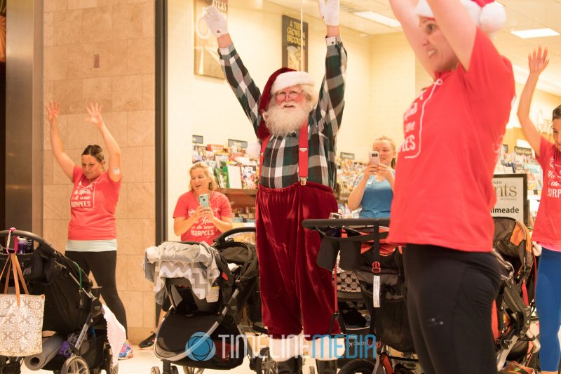 Santa working out with new moms at the Fit4Mom event at Tysons Corner Center