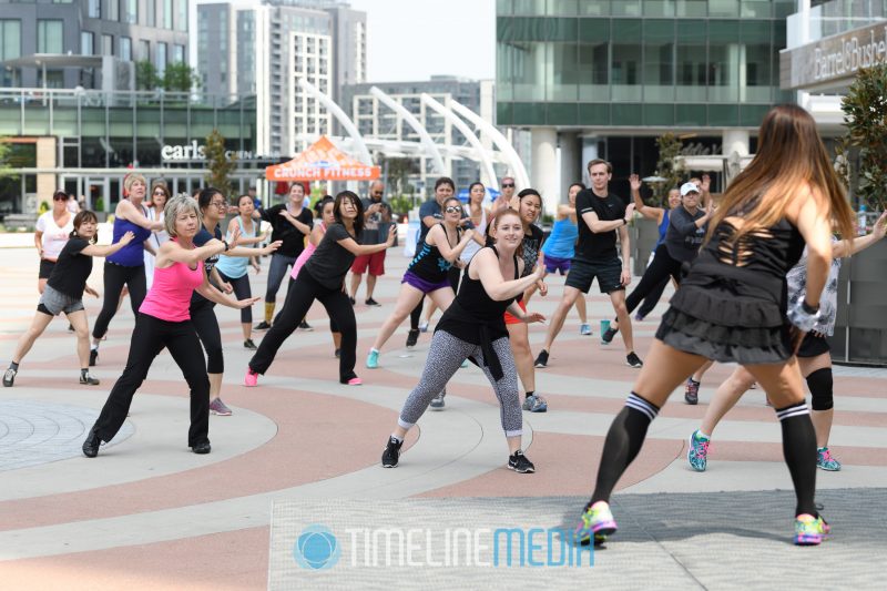 Leading group exercises on the Plaza at Tysons Corner Center ©TimeLine Media