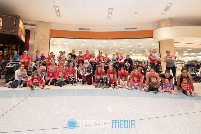 Santa and the Fit4Mom group after their workout at Tysons Corner Center