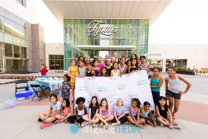 Group photo after a yoga event on the Plaza at Tysons Corner Center ©TimeLine Media