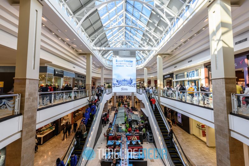 Digital advertising board between two escalators at Tysons Corner Center