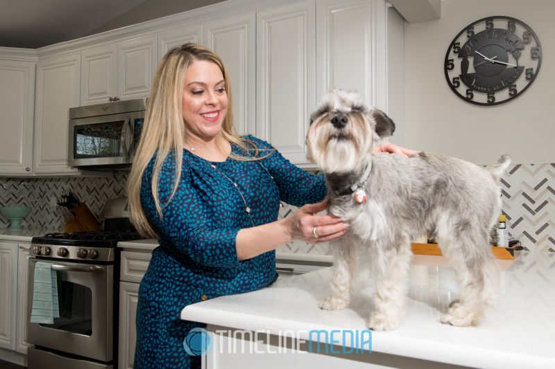 Emilie and one of the residents of the house enjoying his new kitchen ©TimeLine Media