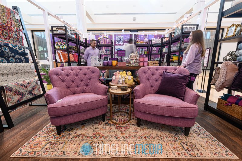 Purple chairs matching the company brand colors at a Tysons Corner Center pop up
