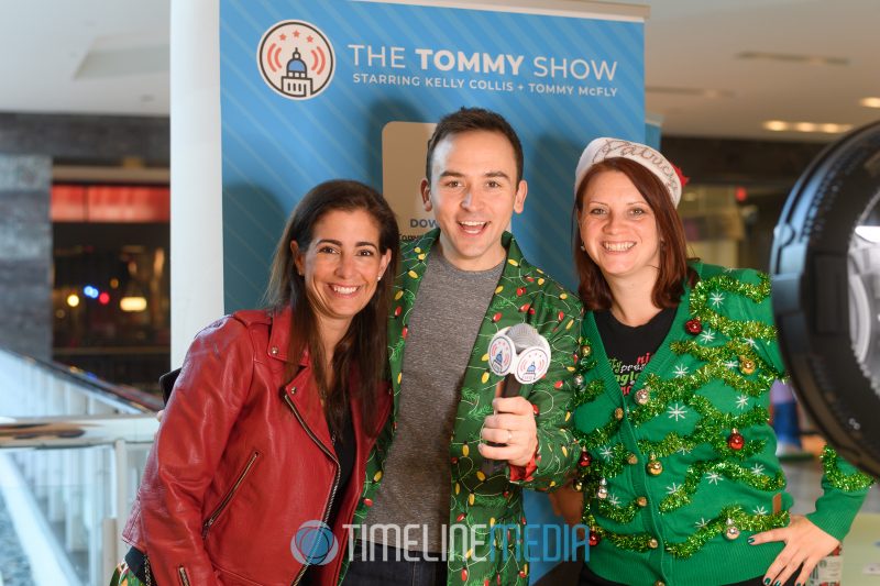 The Tommy Show getting photos with fans at the Santa Breakfast at Tysons Corner Center
