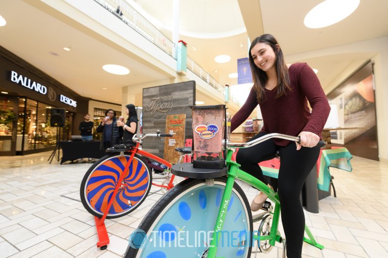 Ashley from Access Tysons uses the bicycle mixer at Tysons Corner Center