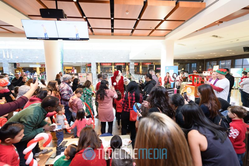 Santa arriving by train at the food court in Tysons Corner Center